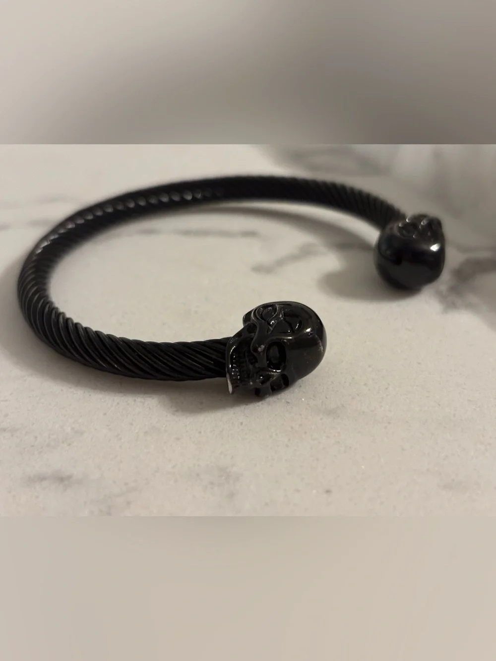 Men's Black Twisted Cable Cuff Bracelet with Skull End Caps